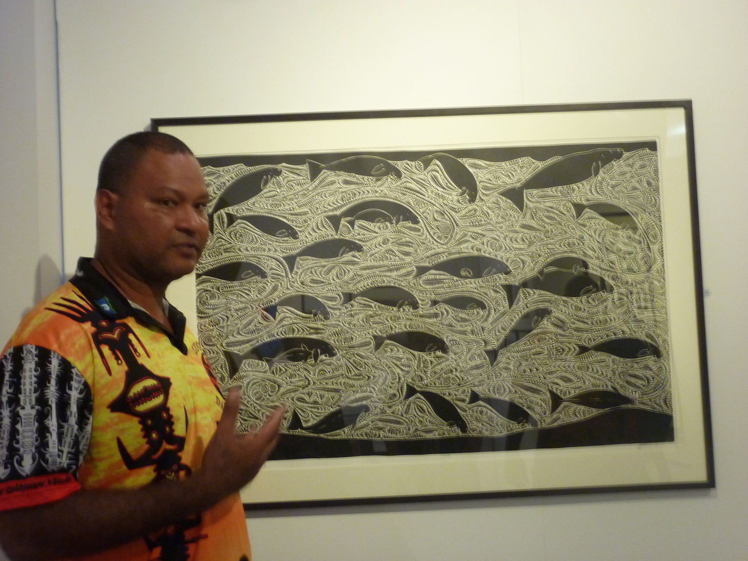 Alick Tipoti talking about his print ULAKAL on display in ‘The Power of Paper’ exhibition.