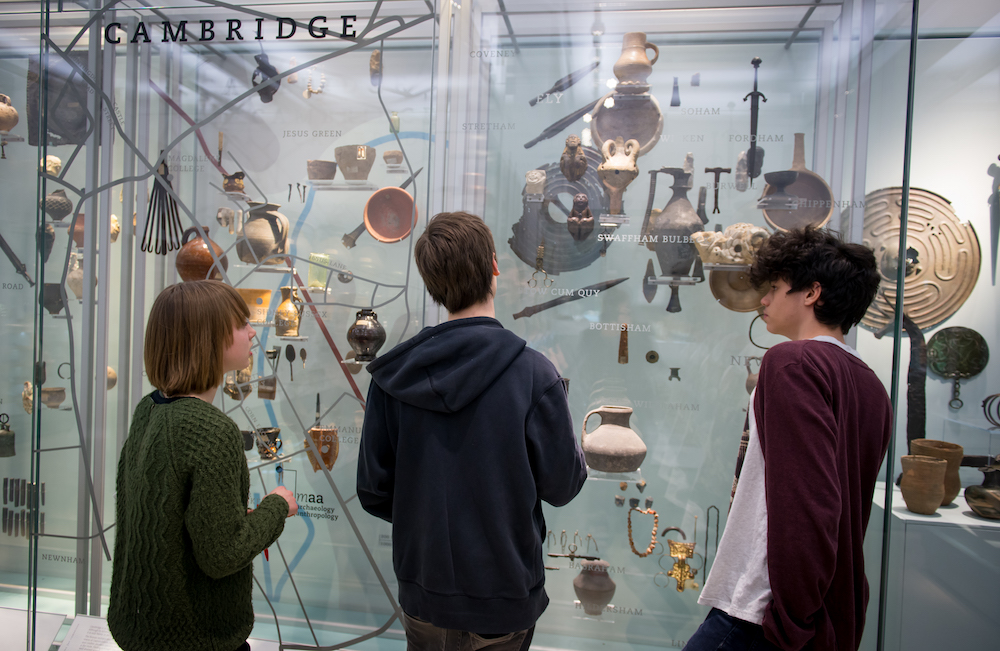 Students look at a display in the Clarke Gallery