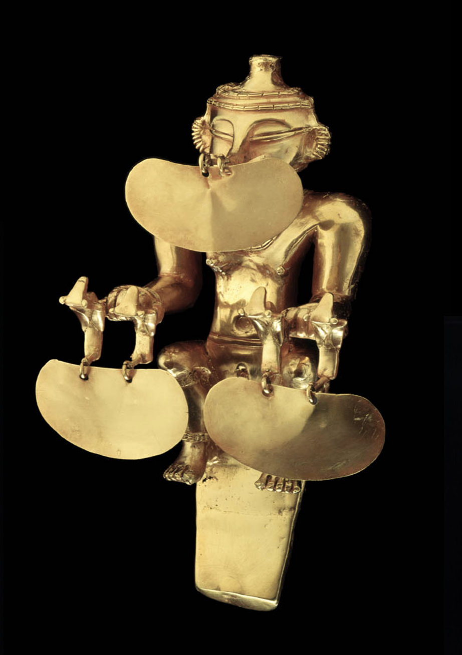 A gold container in the shape of a naked female figure seated on a bench. She wears a helmet on her head and multiple earrings along the edges of both ears. She holds a bird in each hand, attached 2 hanging plates. A 3rd hangs in front of her lower face.