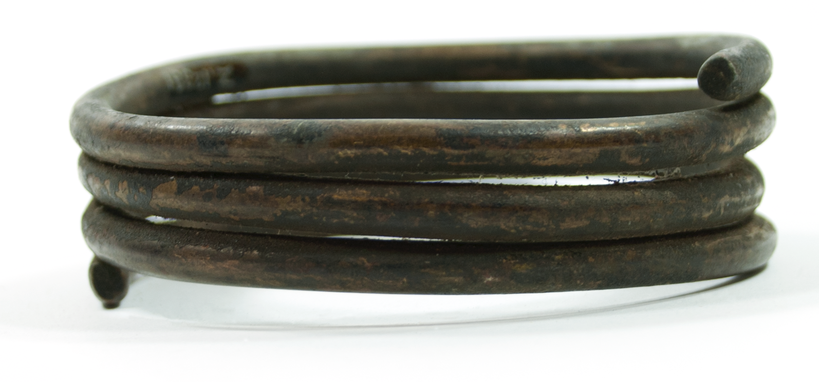 Plain brass bracelet, in three and half coils.
