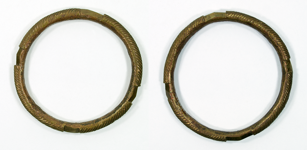 Two large bracelets of wrought brass.