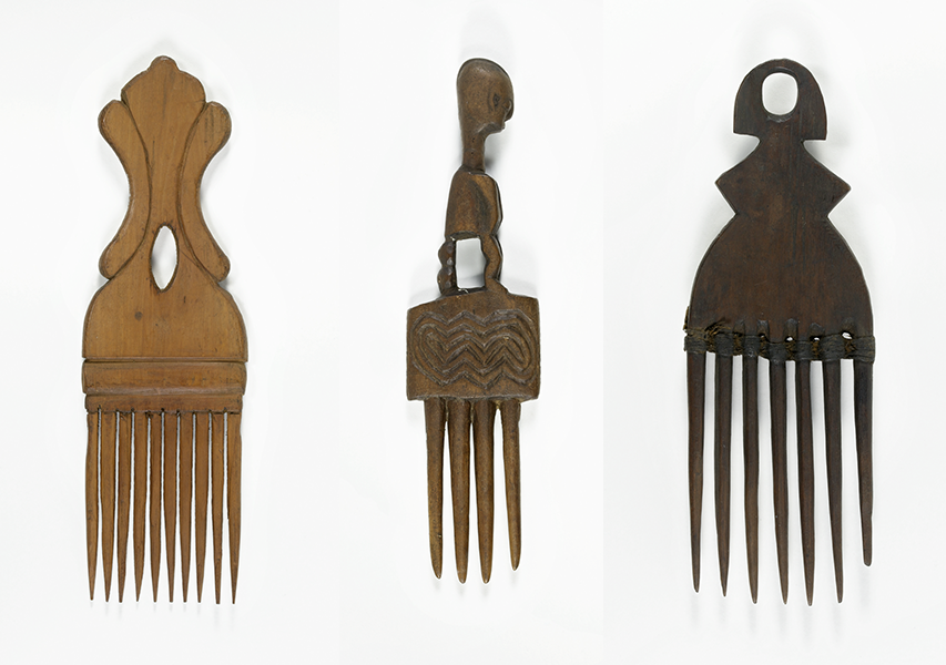 Three combs made of wood, from the Thomas Collection.