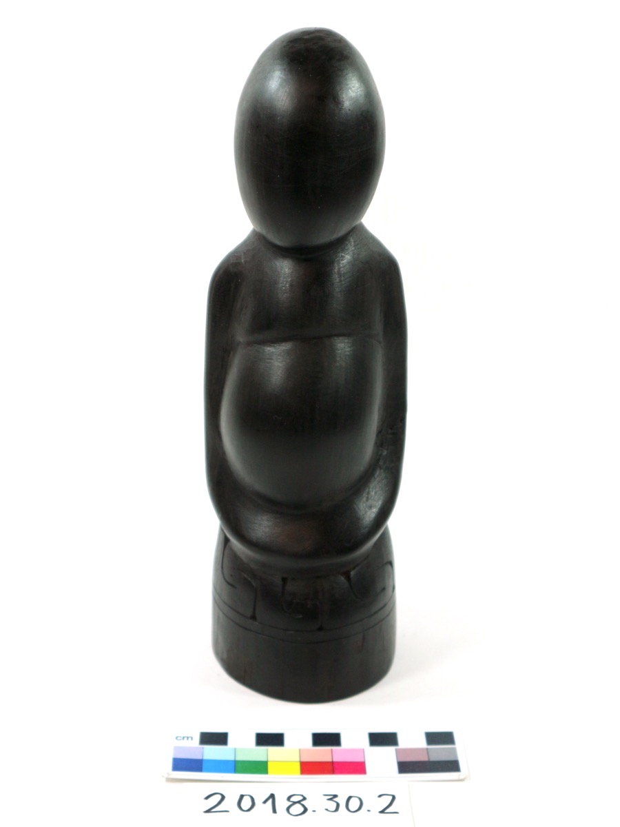 Polished ebony wood (gai) figure of Tudava's (the hero that killed the giant man-eater Dokanikani) pregnant mother Metigisi/Bolitukwa from Alotau, Milne Bay, Papua New Guinea