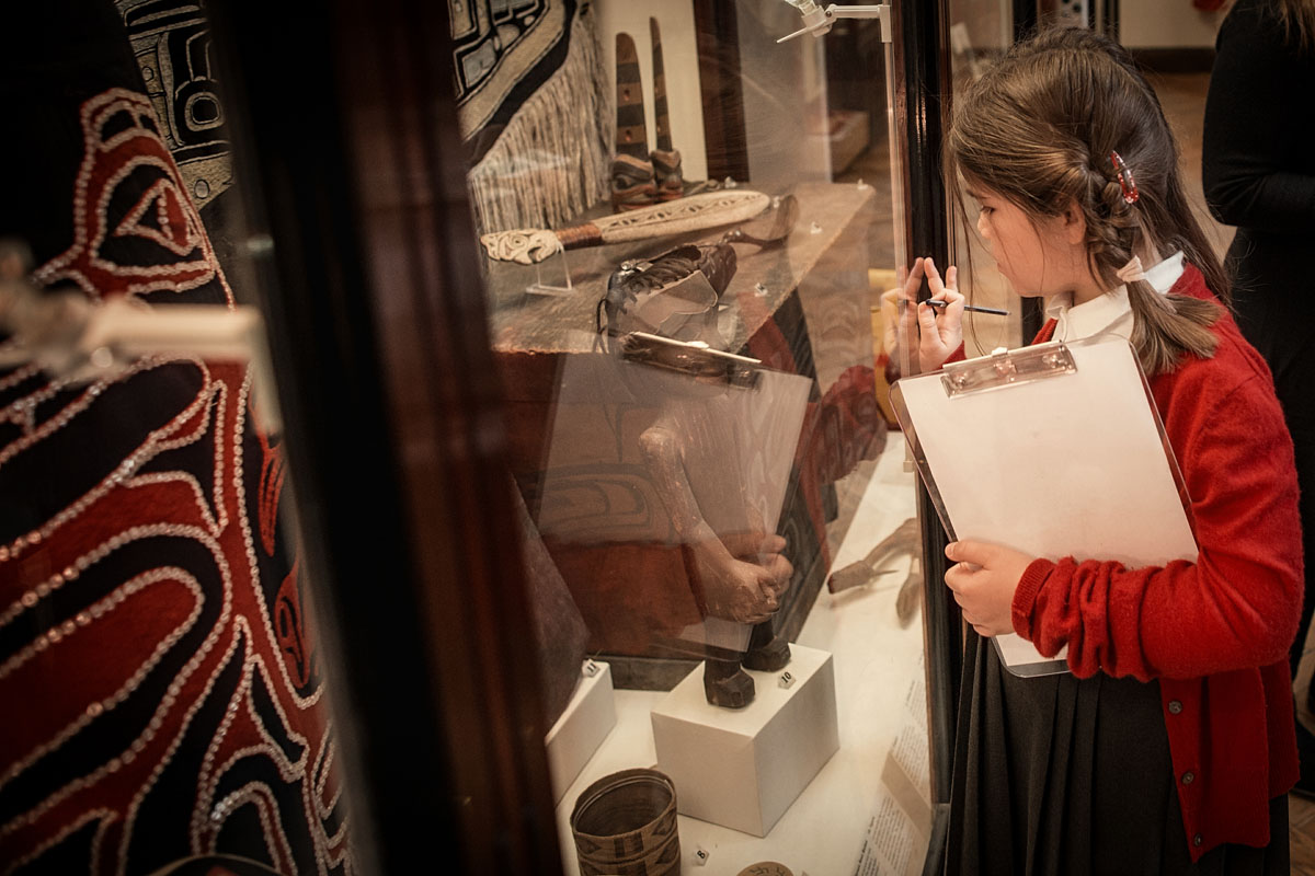 A student looks at a display in the Maudslay Gallery