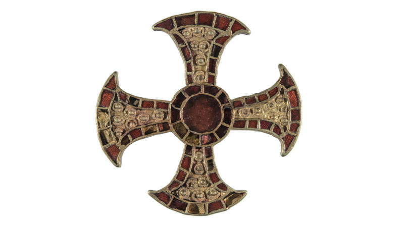 The Trumpington Cross. Gold and garnet cloisonné pectoral cross, with central roundel and flaring arms. Anglo-saxon from Cambridgeshire, UK.