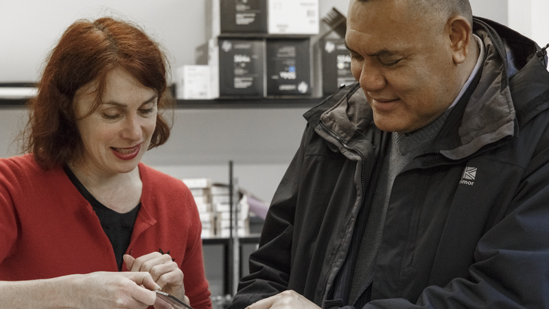 His Excellency Jitoko Tikolevu and Dr Jos Dudding examine a photograph during a visit in 2018