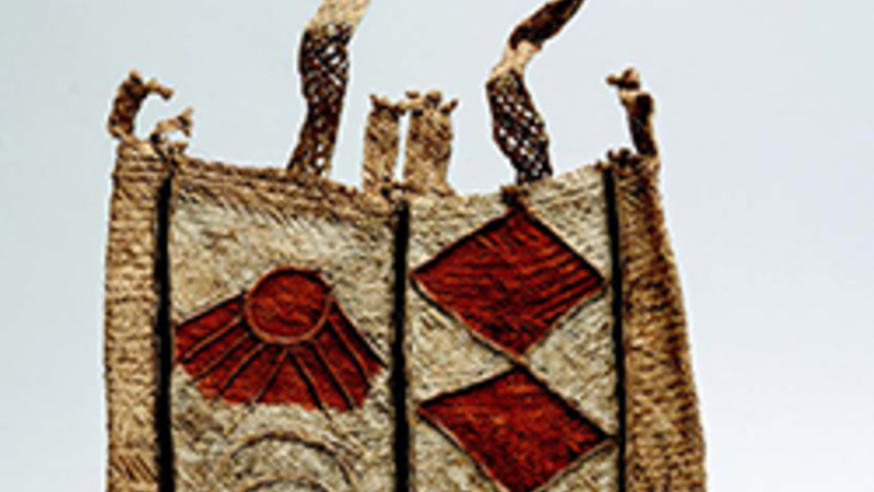 Handmade woven bag with red diamond detailing on the right hand side, and sun moon and star motifs on the left. A rectangular shaped bag with a long top handle