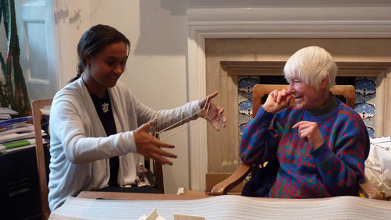 P1080204_smallAmelia Mari demonstrating string figures to Haddon’s granddaughter Margaret Rishbeth.