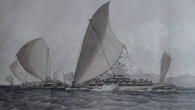 A painting of a fleet of drum off the coast of Ovalau Island. Large boats struggle in the wind and choppy seas, with large asymmetrical sails and lots of men on board. The whole scene is shades of grey.