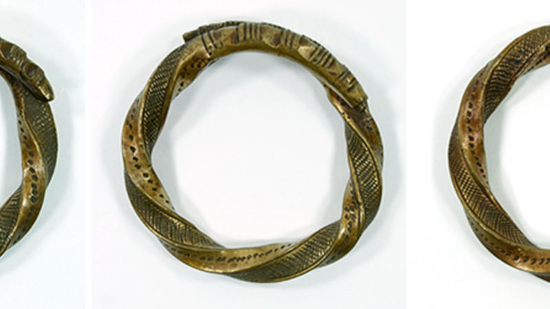 Three bracelets of wrought brass. See description for full details.