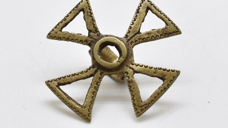 Brass ring with open work cross.