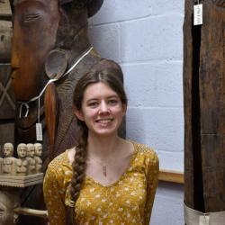 A colour photograph of Lily Stancliffe, Collections Assistant for the MAA Stores Move