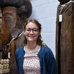 A colour photograph of Louise Puckett, Collections Assistant for the MAA Stores Move