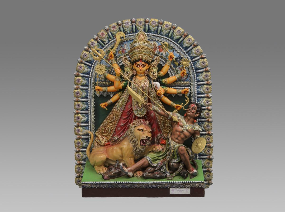 Fibre glass pratima (idol) of the Hindu goddess Durga slaying Mahisha, made by Mintu Paul.