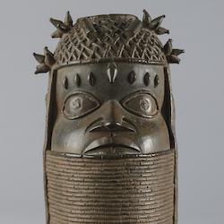 Lost-wax cast commemorative head of an Oba, used to support a tusk on an ancestral altar