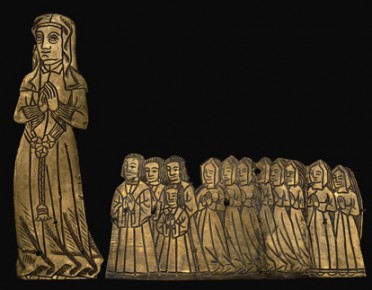 A medieval funerary monument of a lady with her four sons and eight daughters from Aldenham, Hertfordshire.