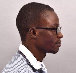 A colour photograph of George Agbo, MAA Research Associate